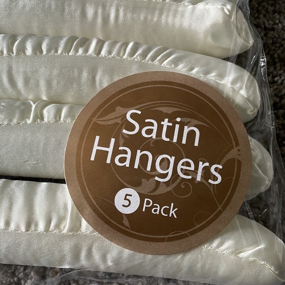 Brand new in package cream color satin hangers. Pack of 5 have multiple packs - Picture 2 of 4